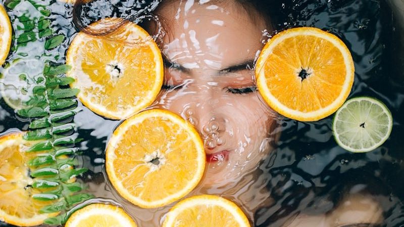 sliced lemon on bathtub, 5 Life-Changing Skincare Tips for Flawless Skin