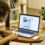 woman browsing on her laptop