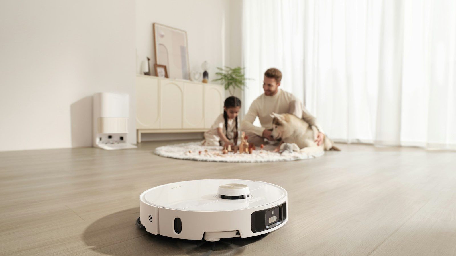 Robot vacuum cleans floor while family relaxes Automated and Robotic Automating Parts of Your Marketing