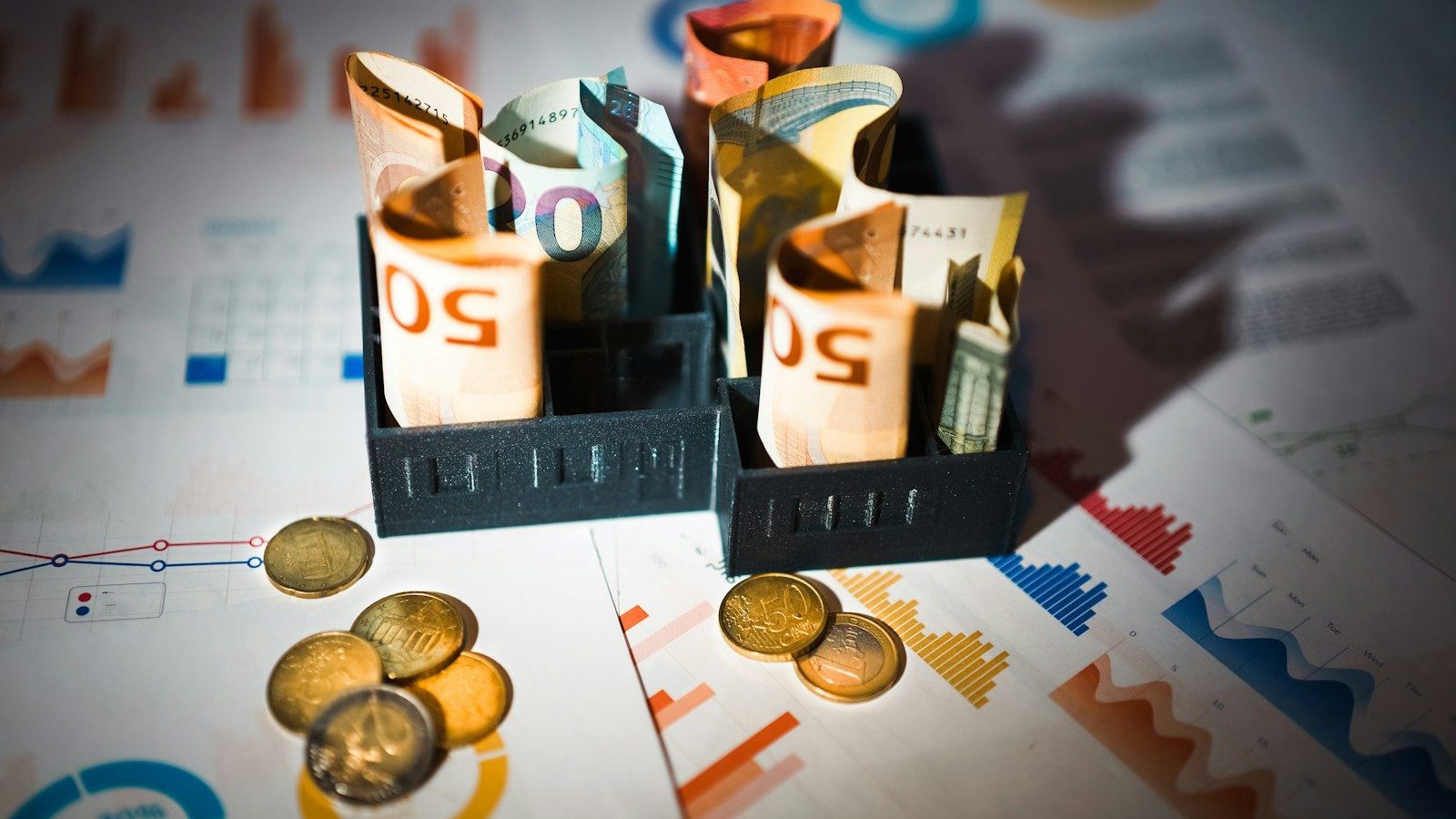 A pile of money sitting on top of a table Maintaining Cash Flow Stability Building a Safety Net