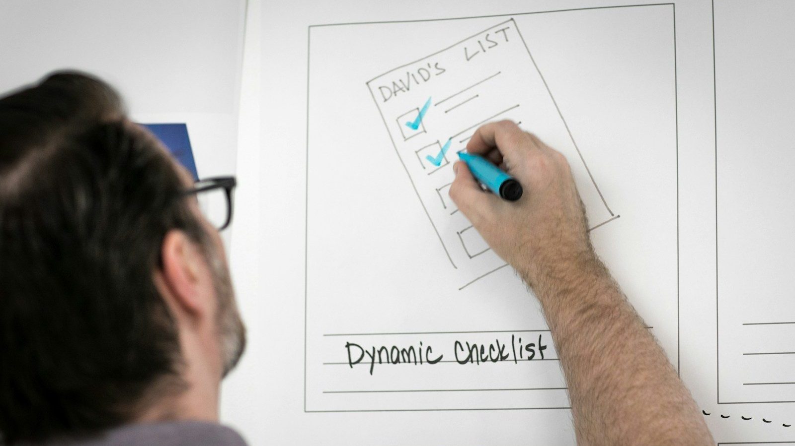person writing on whiteboard Operational Flexibility Right Choice