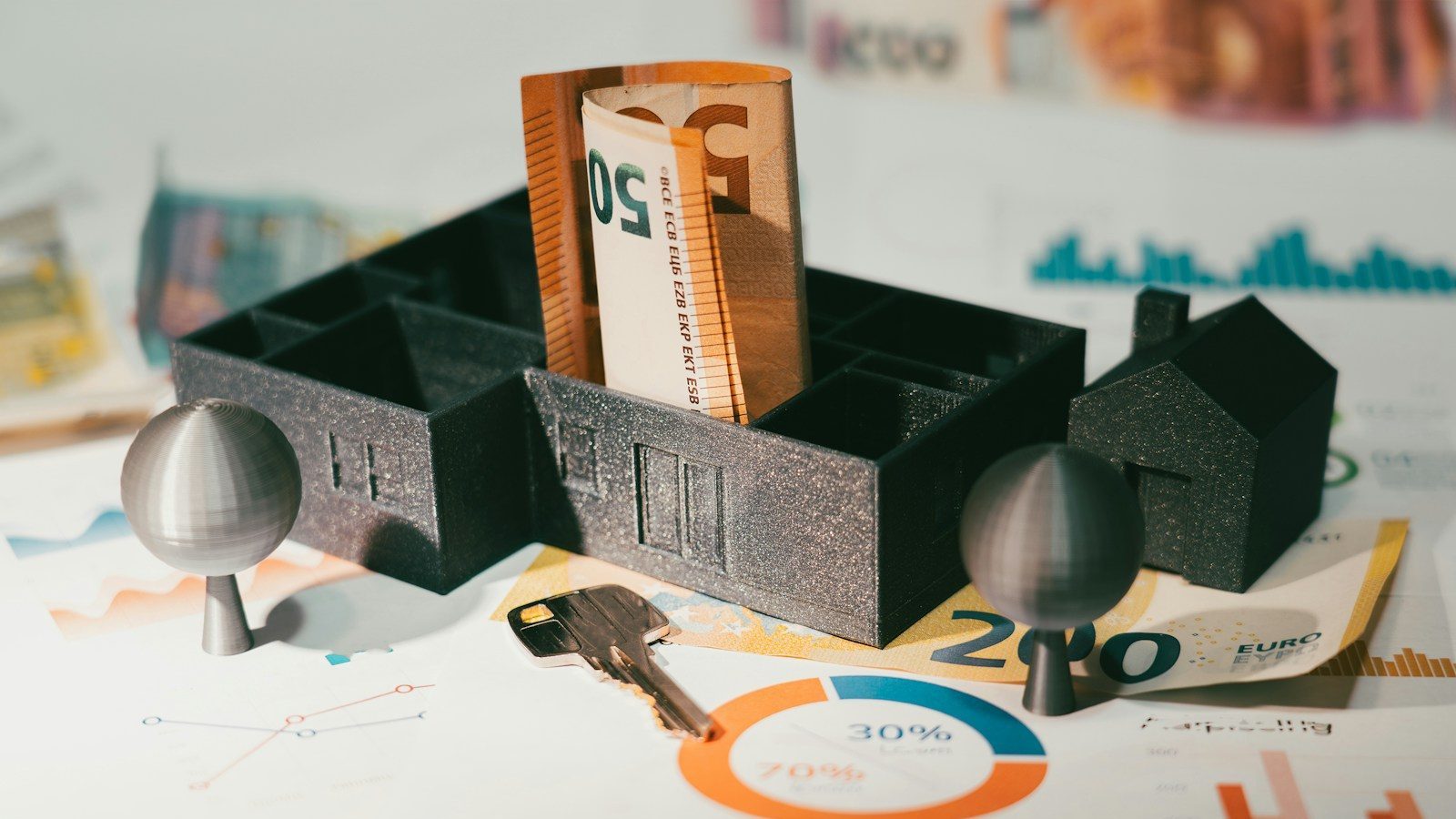 A couple of keys are sitting in a holder Financing Opportunities Credit Score for Business Owners