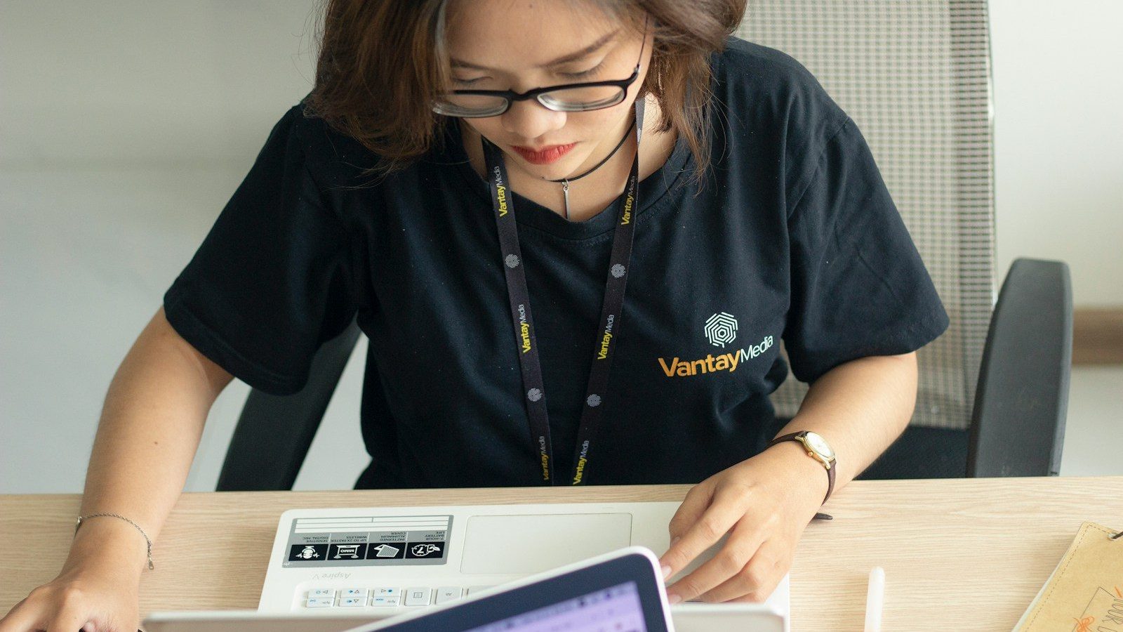 woman looking at laptop Personalize Customer Service Building Brand Loyalty