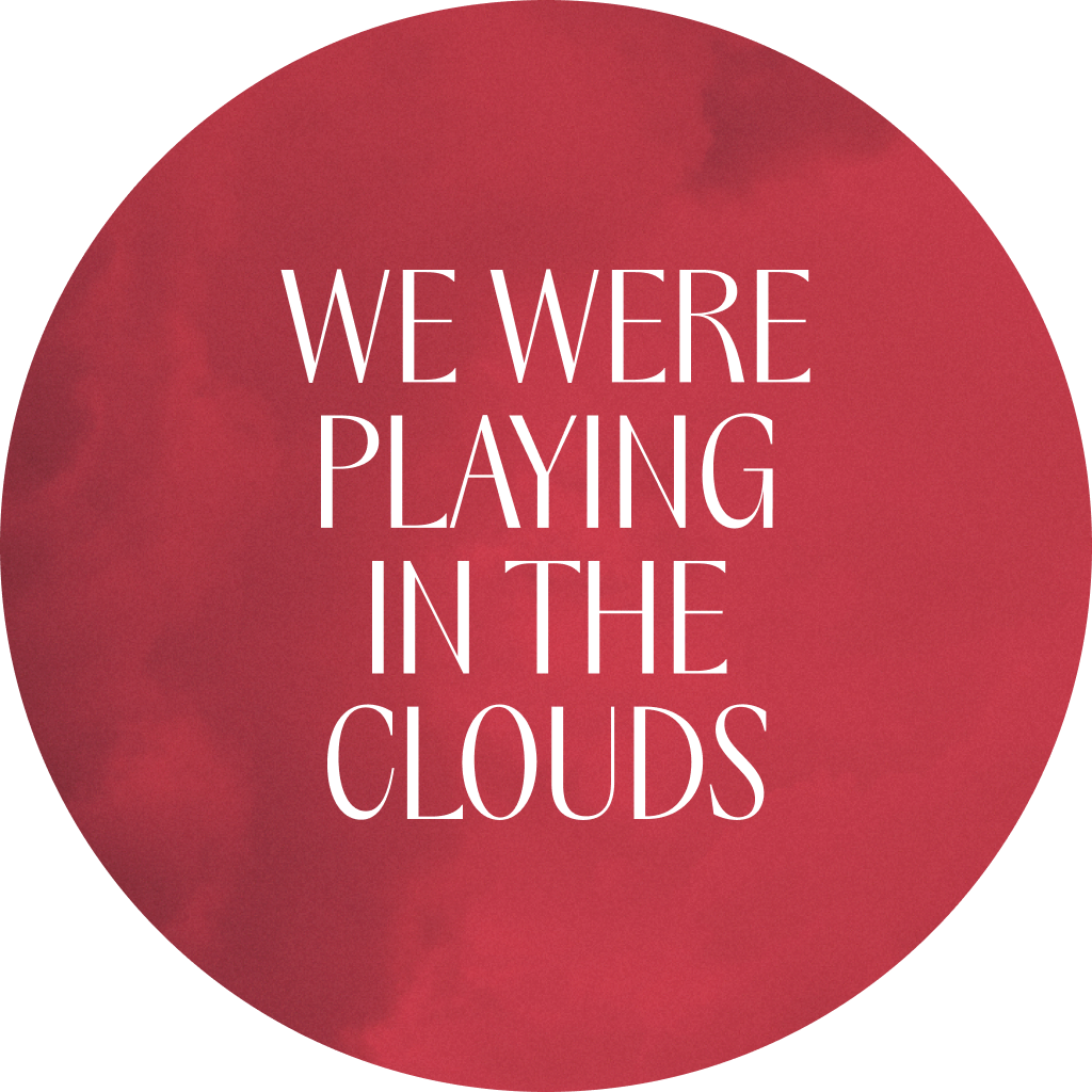 Text: "WE WERE PLAYING IN THE CLOUDS"