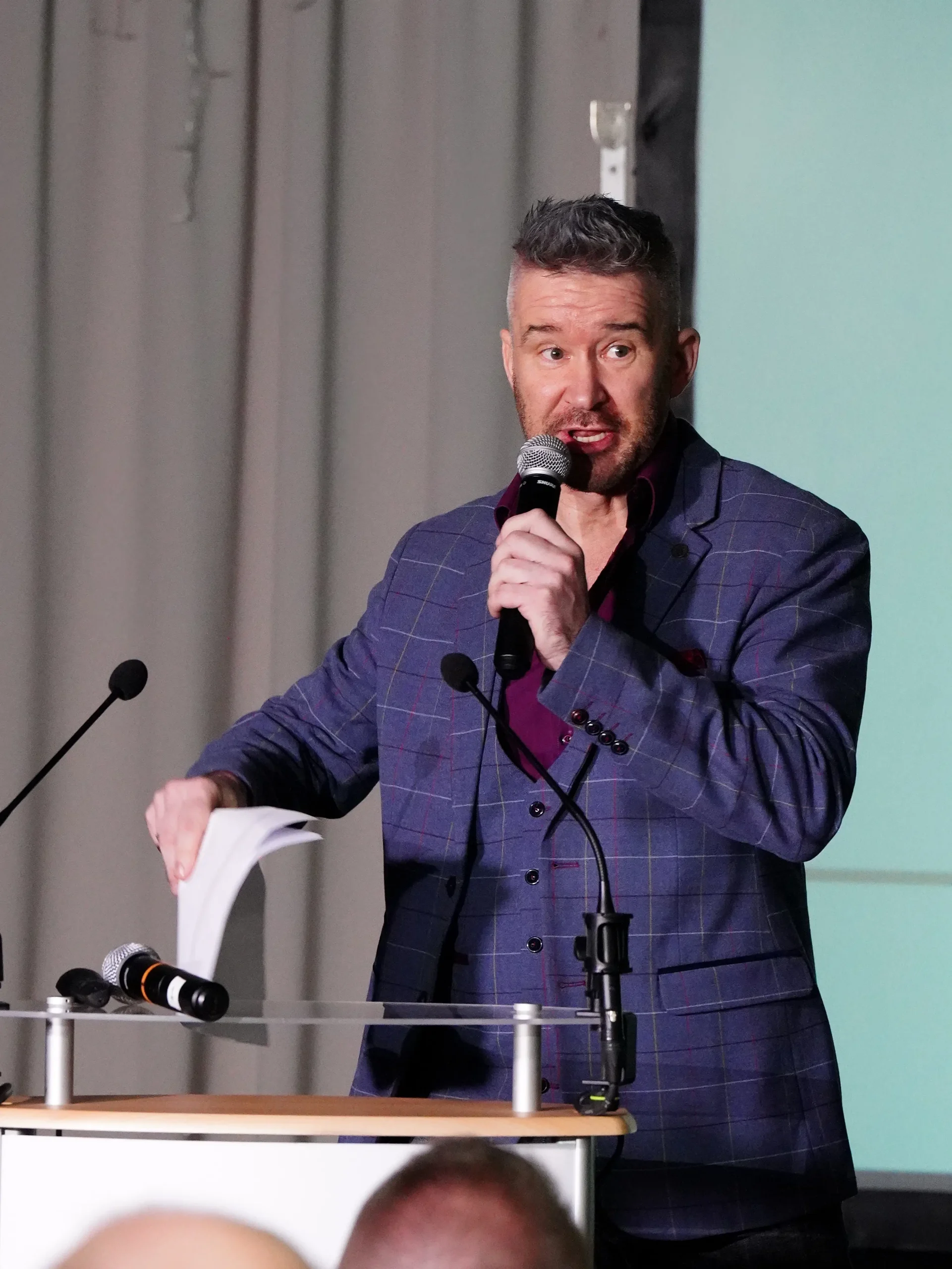 Steve McKenna conducting a charity auction