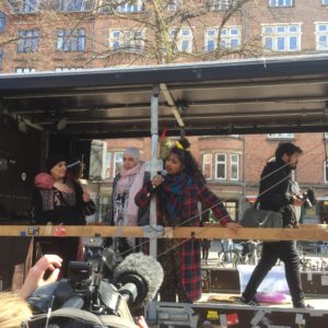 Organiser Uzma Ahmad speaking to the crowd