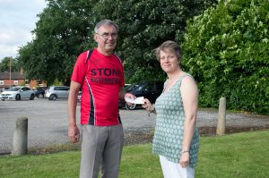 SMM's John Haine presents Hub Manager, Karen Wardell, with the cheque