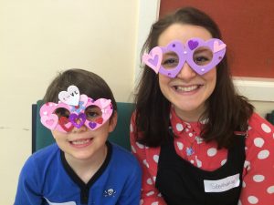 Children with Fancy dress paper glasses smiling