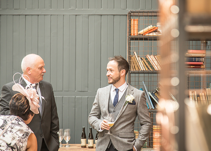 wylam brewery groom with guest reportage wedding photography