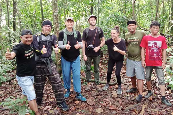 Group of people on jungle trekking in Bukit Lawang