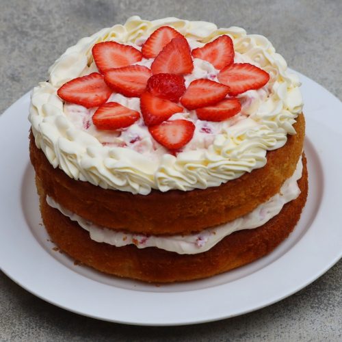 Coconut, strawberries and cream cake