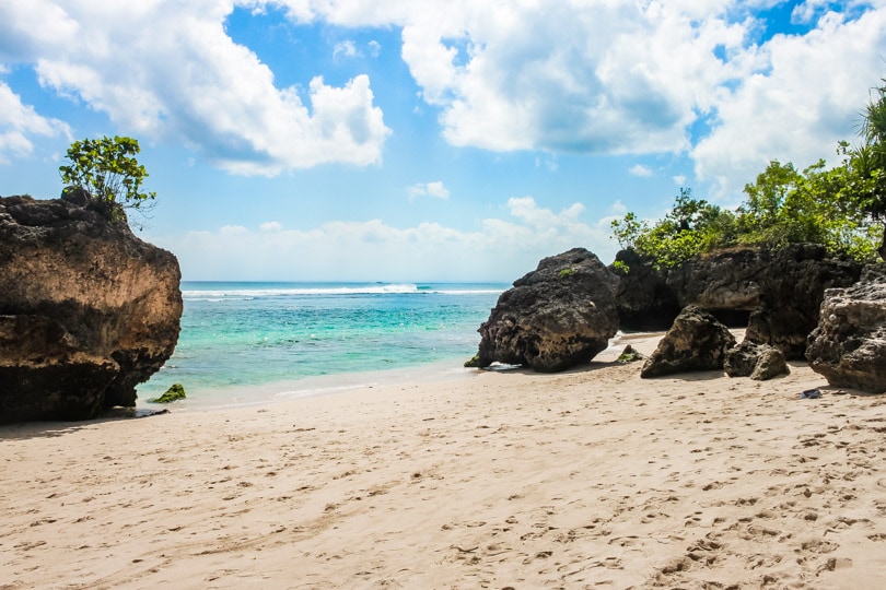 An empty Padang Padang Beach, one of the best beaches in Uluwatu Bali.