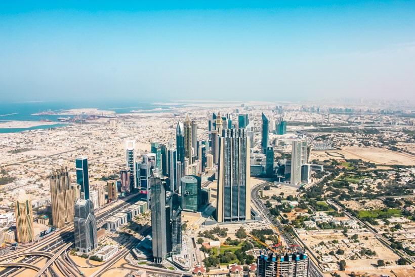 View of skyscrapers and the ocean from Burj Khalifa, one of the top attractions to visit during your two days in Dubai.