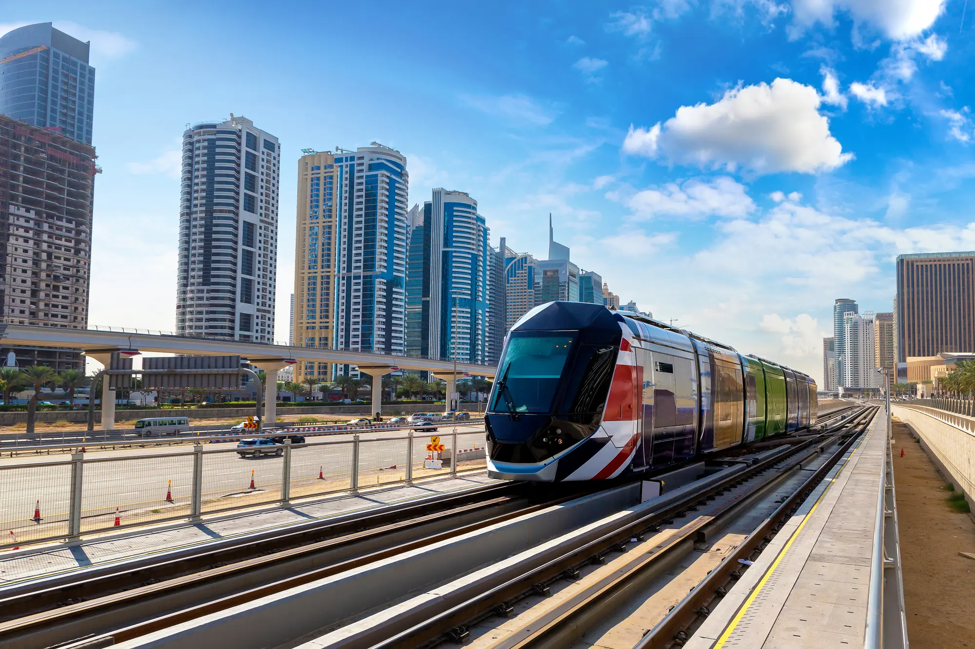 Dubai modern tram with skyscrapers in the background, an easy way to get around during your two days in Dubai.