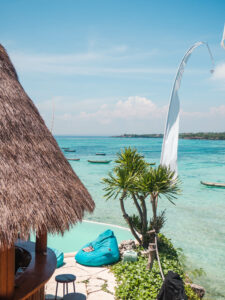 View of the pool and bar at Le Pirate Beach Club on Nusa Ceningan