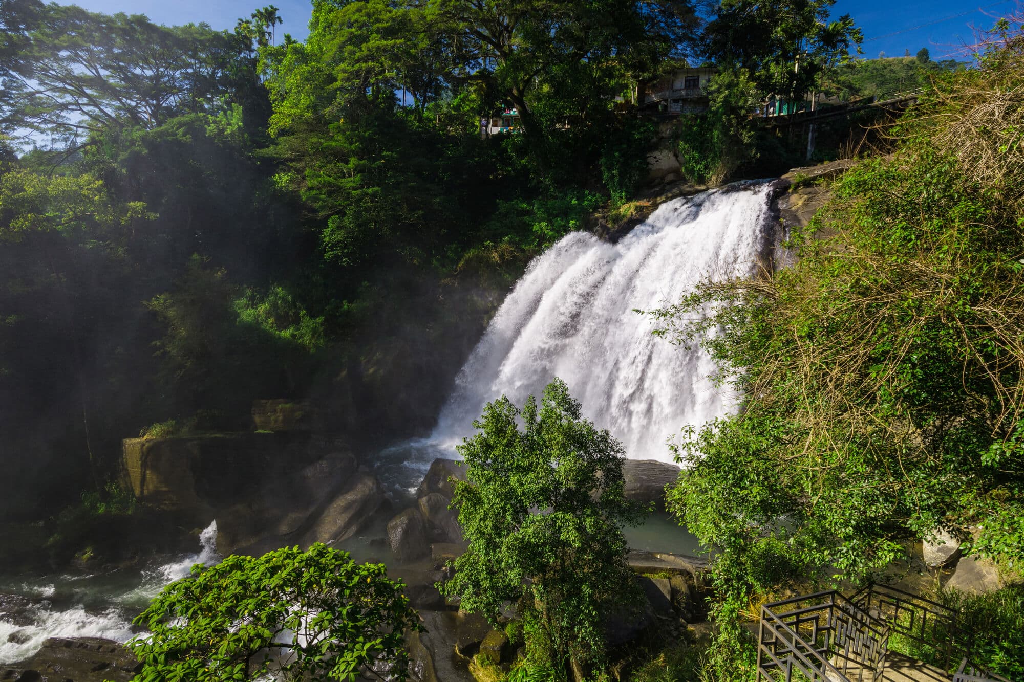 Hulu River Waterfall surrounded by greenery, one of the best places to visit just outside Kandy.