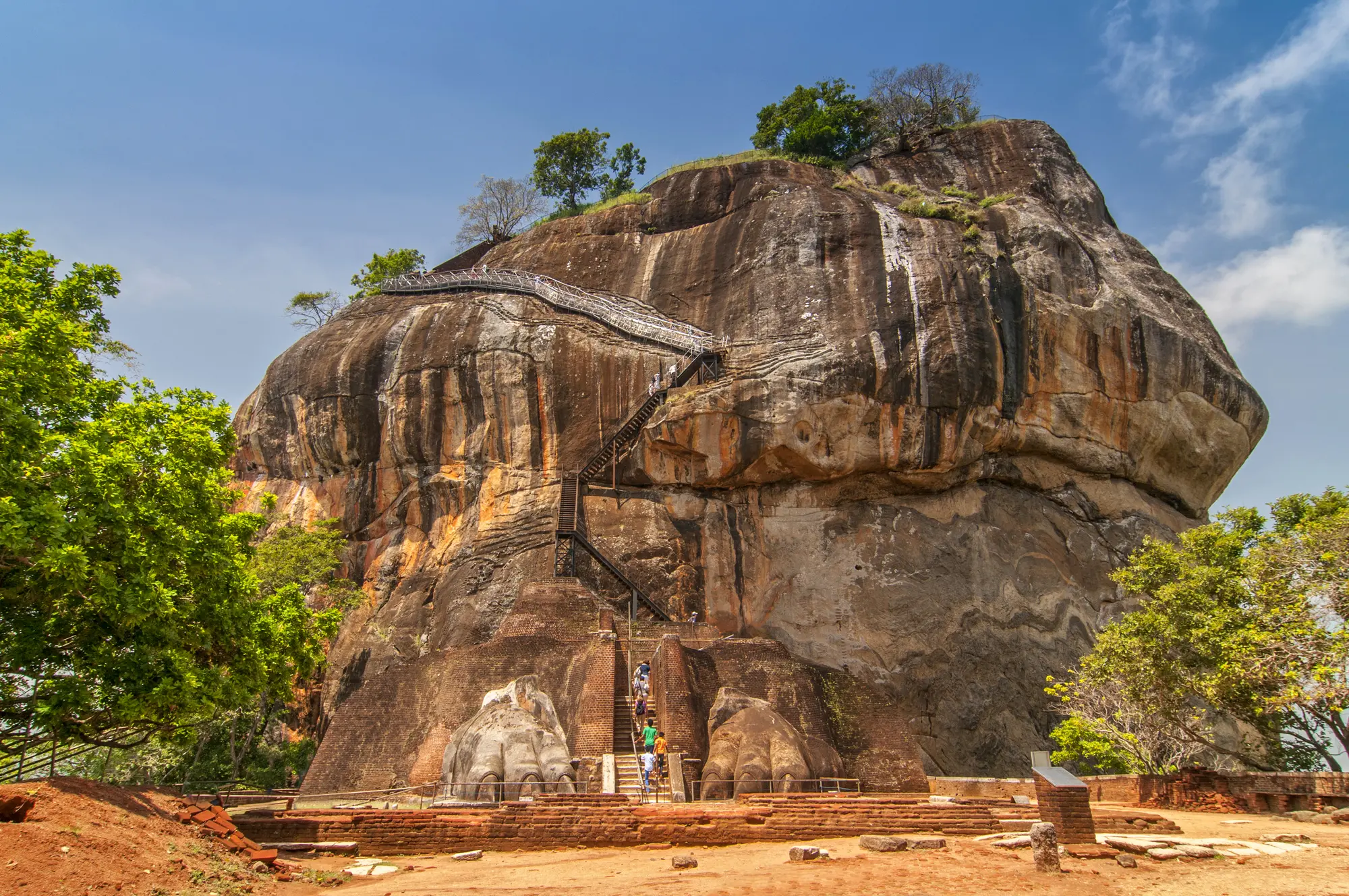 Looking towards the lion's feat and steep stairs at Sigiriya Rock during a 2-week Sri Lanka itinerary.