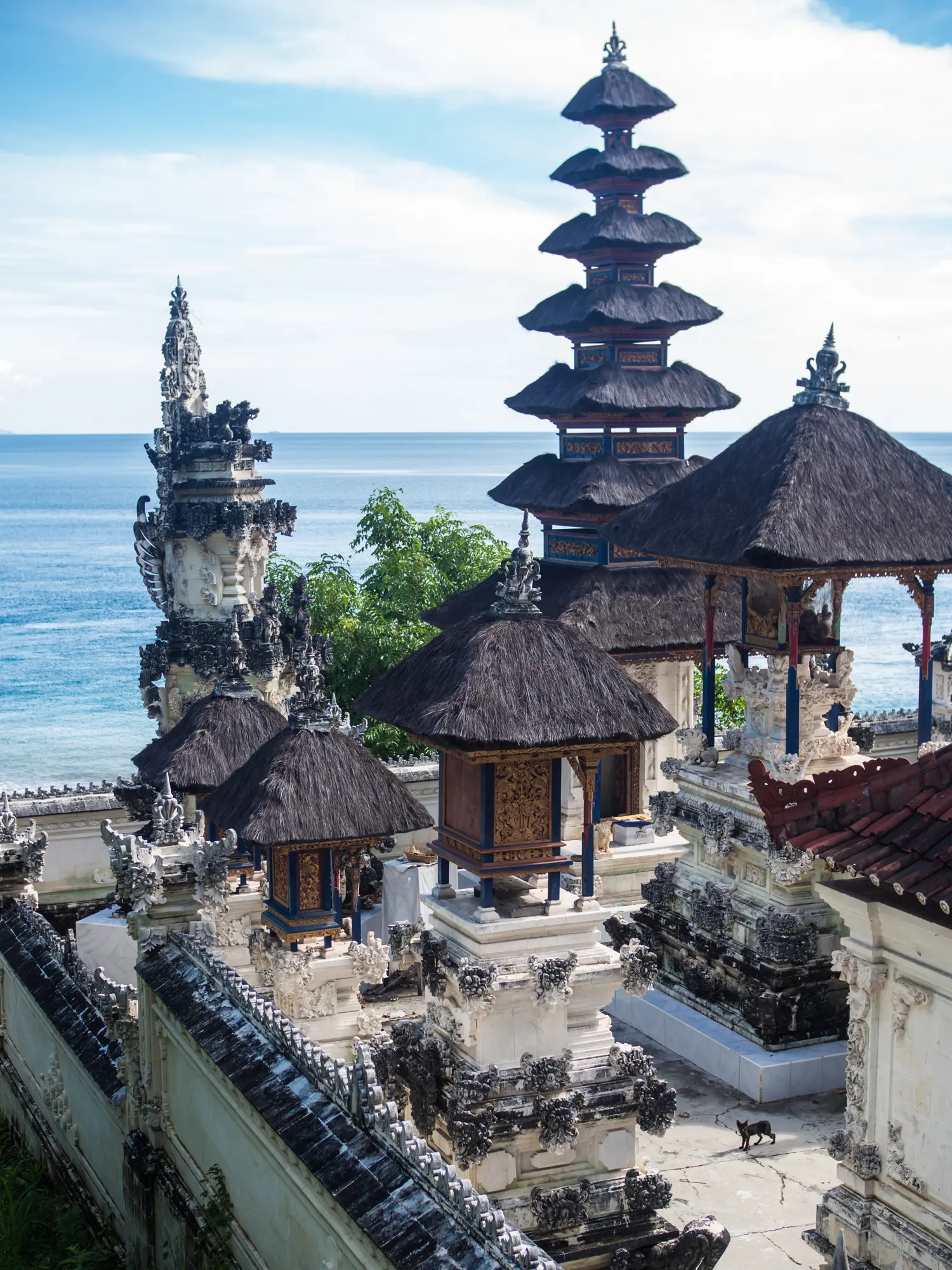 White traditional temple by the ocean in Nusa Penida, one of the many reasons making the island worth visiting.