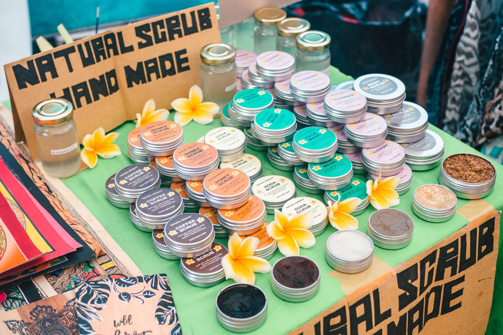 A table of natural skincare scrubs at Love Anchor Weekend Bazar Market in Canggu, Bali 