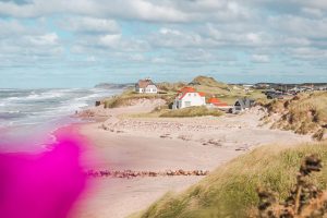 The Ultimate Denmark Bucket List. 101 awesome things to do - View of two houses on Lokken Beach