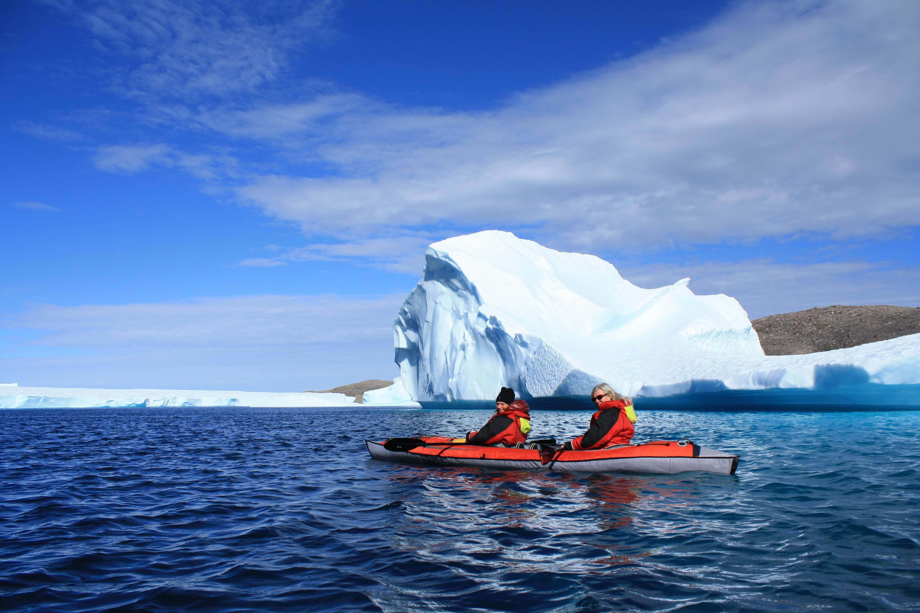 29 of the most unforgettable travel experiences in the world - Kayaking among icebergs in Nunavut, Canada