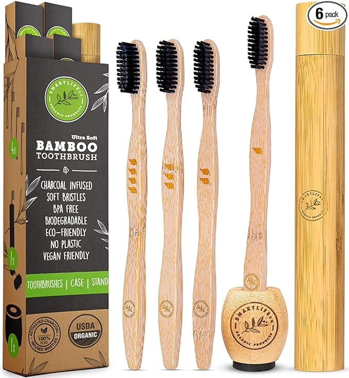 Bamboo toothbrush set with charcoal and travel case, the best travel gift idea under $50.