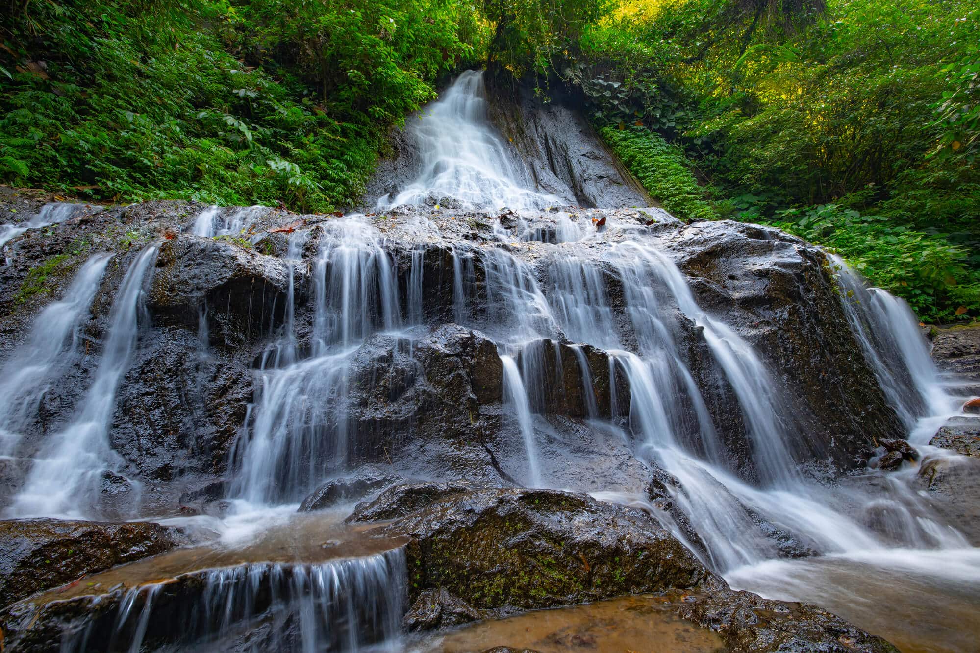 A guide to all the best waterfalls in Ubud Bali - Goa Giri Campuhan Waterfall, also known as GGC