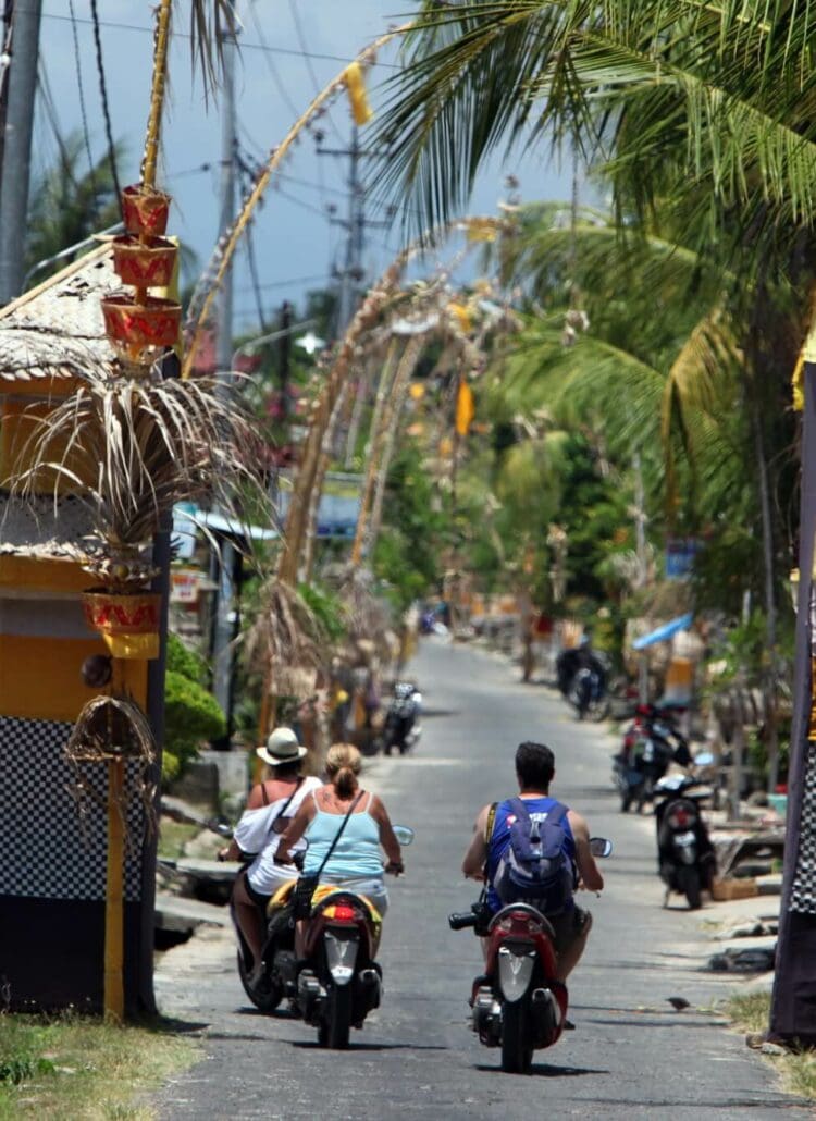 How to get around on Nusa Lembongan - Scooters on one of the narrow main streets