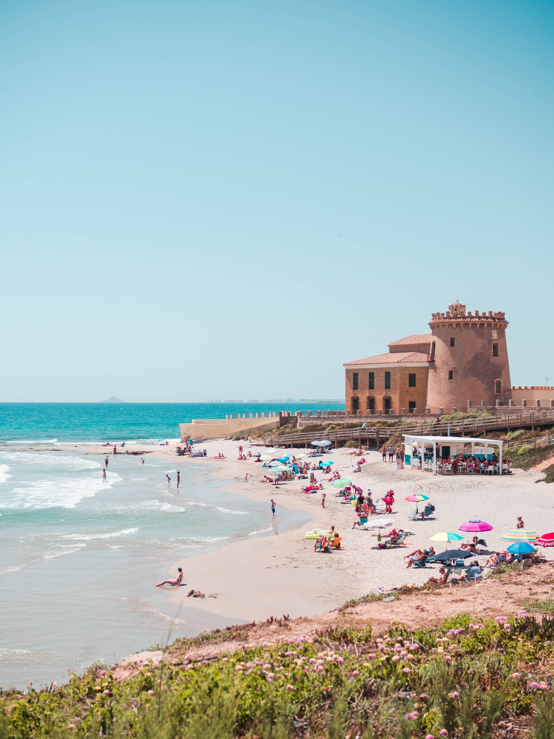 The beautiful Playa El Conde with a 16th-century watchtower in the background, one of my favorite beaches close to Hacienda Riquelme Golf Resort
