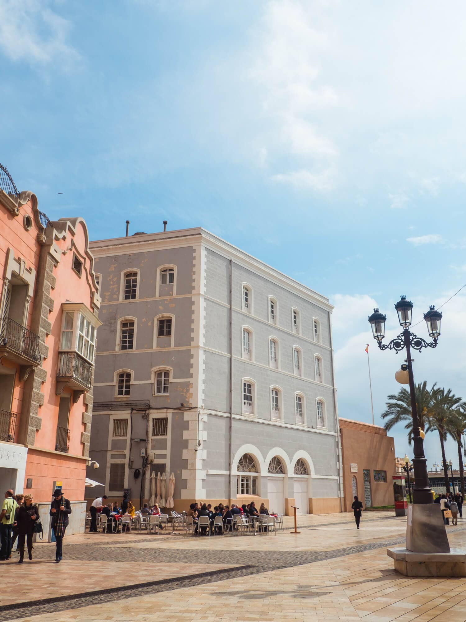 Marvel at the beautiful and colorful architecture in Cartagena, a historic cruise port in Spain