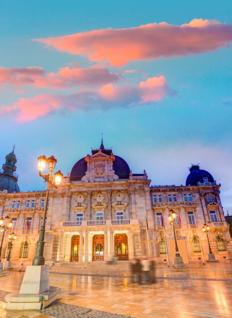 Majestic building in Cartagena's old town at dusk during a pink sunset, close to Cartagena Spain Cruise Port.