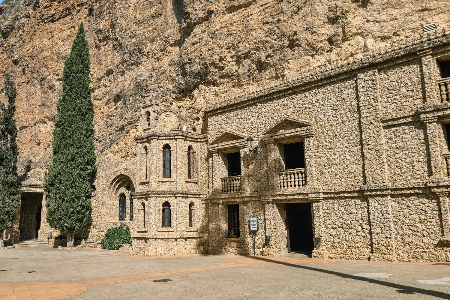Church built into the limestone wall at Santuario Nuestra Señora de la Esperanza, one of the top things to do in Murcia Spain.