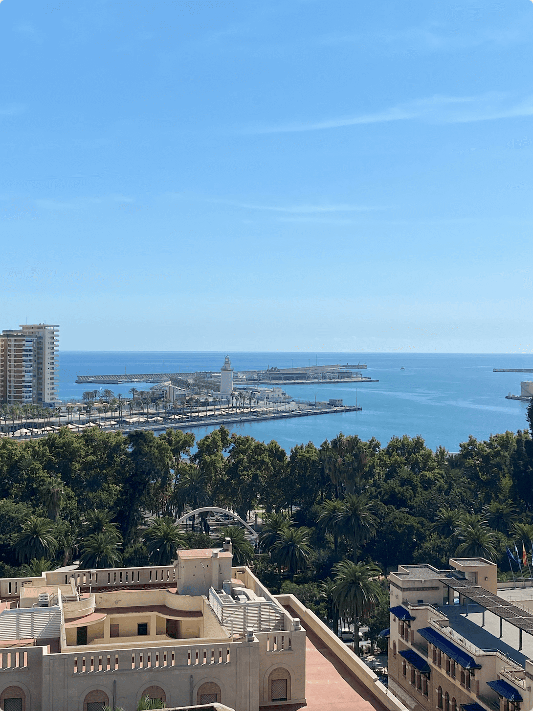 Malaga Cruise Port seen from a viewpoint in the city on a sunny day.