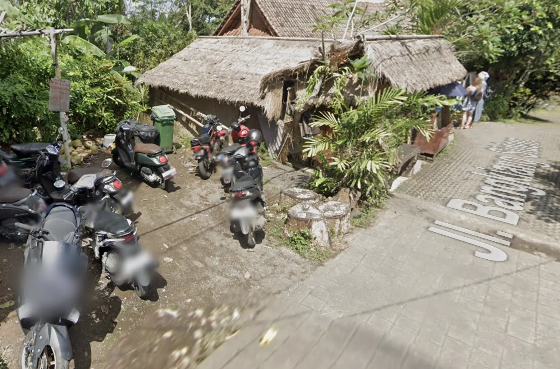 Dirt scooter parking lot at the north entrance of Campuhan Ridge Walk in Ubud, Bali.