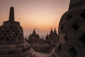 Stupas at the top of Borobudur Temple in Yogyakarta - Indonesia vs. Thailand temples.