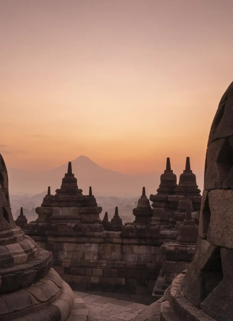 Stupas at the top of Borobudur Temple in Yogyakarta - Indonesia vs. Thailand temples.