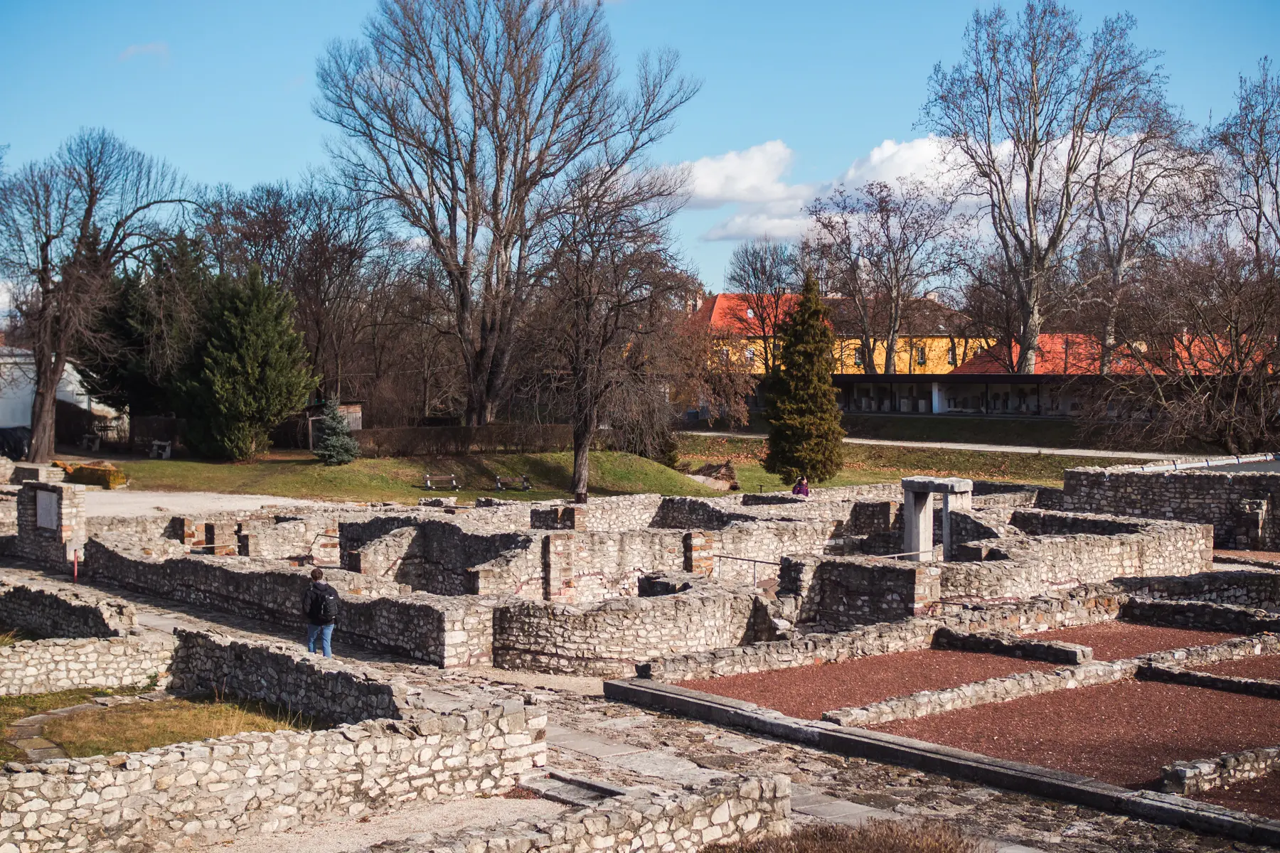 Old stone ruins of a Roman town at Aquincum Museum, a hidden gem in Budapest.