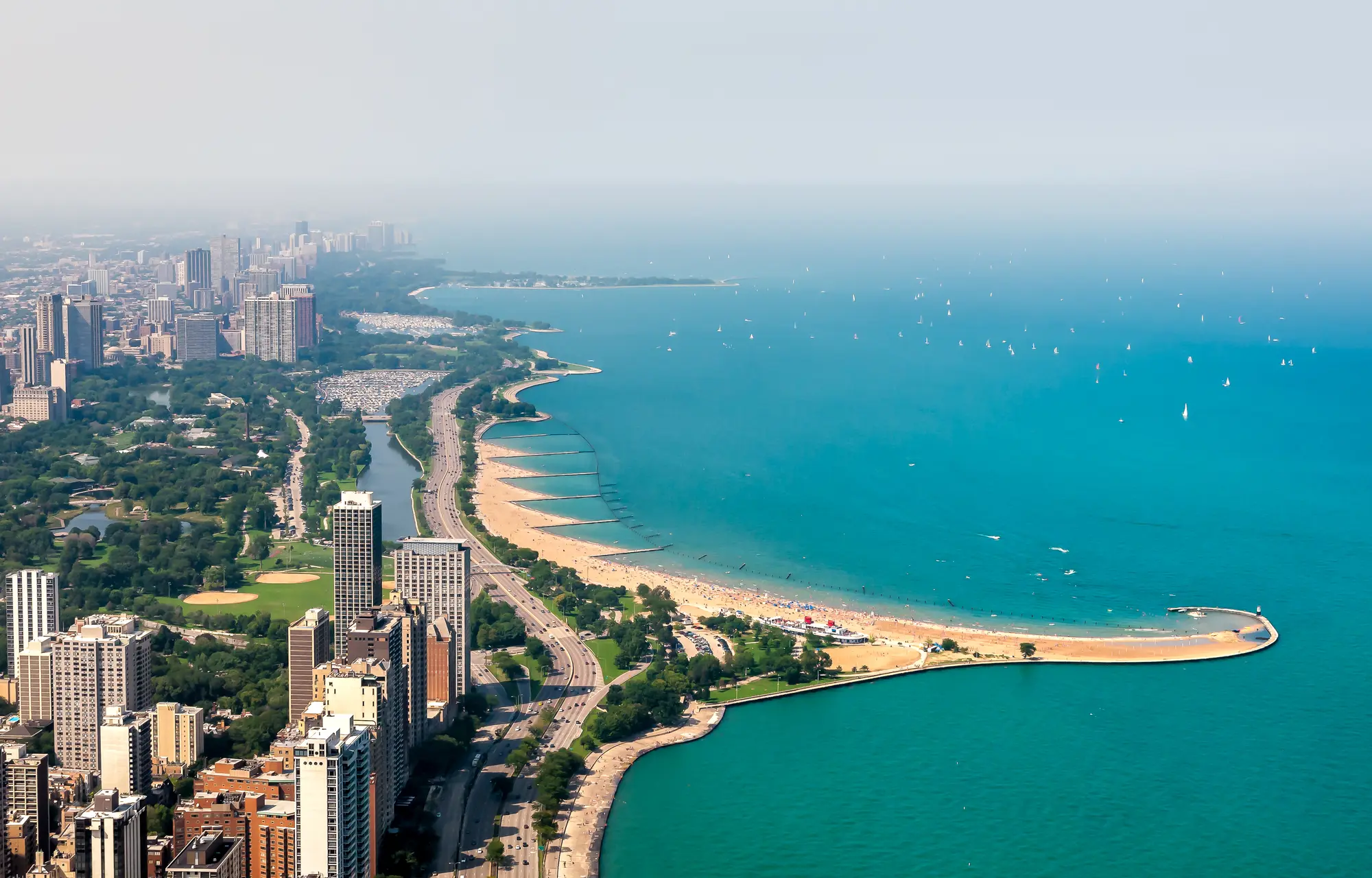 Aerial view of Gold Coast with its skyscrapers, Lincoln Park and North Avenue Beach that stretches into the lake, a must during your weekend in Chicago.