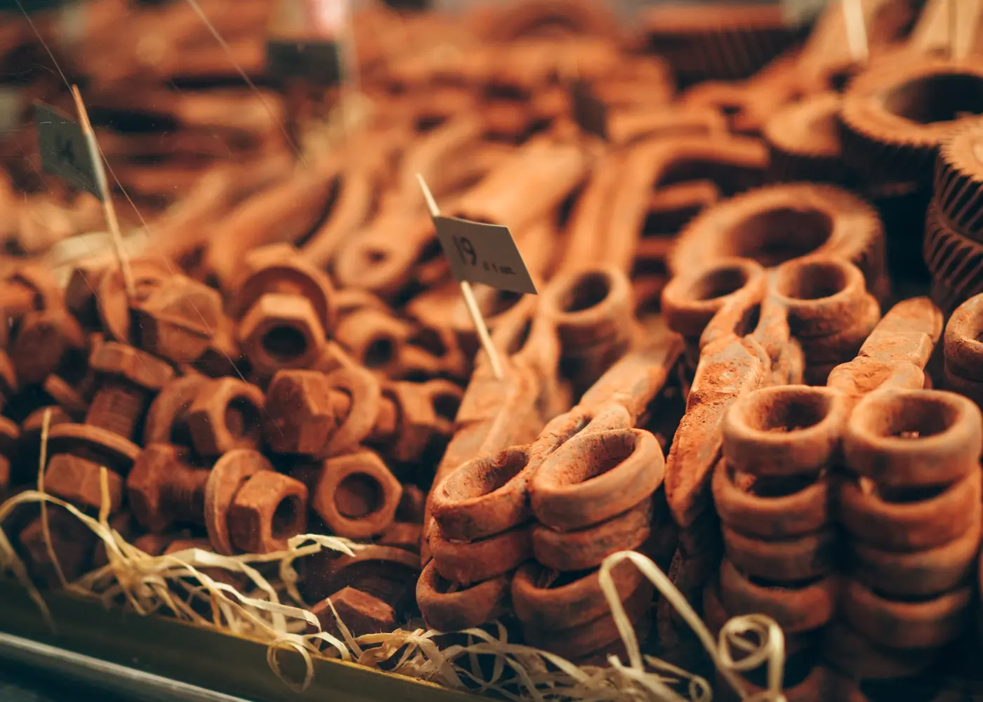 Close up of scissors and other tools made from chocolate, the perfect gift to buy at Krakow Christmas Market.