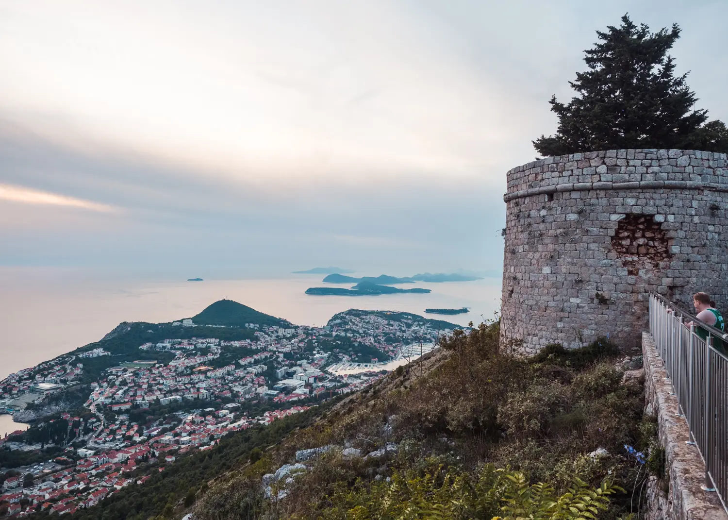 Old stone tower at Fort Imperial looking over Dubrovnik with islands and the ocean in the background from Mount Srd. How to get there.