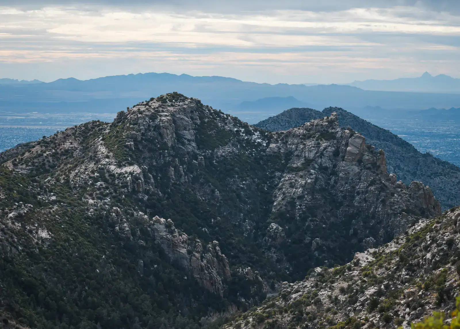 View of Mount Lemmon while in Sabino Canyon on a cloudy day, one of the top things to do in Tucson.