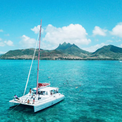 Catamaran Cruise Ile Aux Cerf and GRSE Waterfall visit and Snorkeling