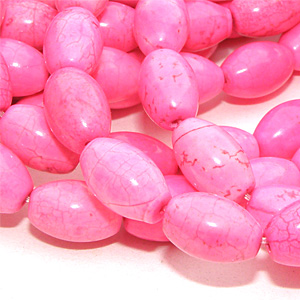 Färgad magnesit slät risform ljus cerise 12×8 mm