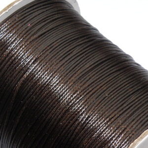Vaxad polyestertråd mörkbrun 0,5 mm