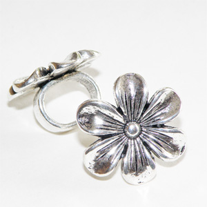 Antiksilverfärgad blomma med ovalt hål 20 mm