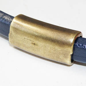 Bronsfärgad metall tub 28×13 mm till ovalt läder