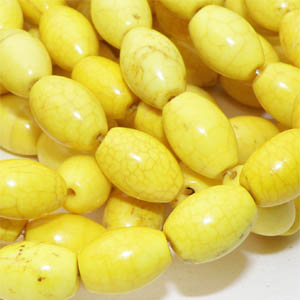 Färgad magnesit slät risform gul 12×8 mm