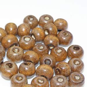 Träkulor bruna ca 7x6 mm