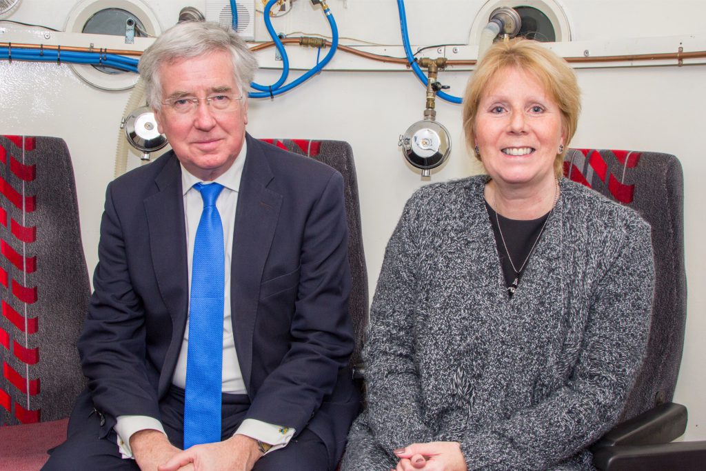 Michael Fallon 2 Michael Fallon MP inside the oxygen therapy chamber with manager Deborah Clarke