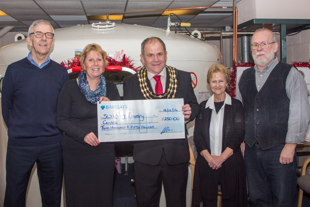 Cllr Ball, Mayor of Swanley, presents a cheque to Swanley Therapy Centre